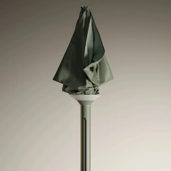 Capa de proteção verde sobre o pólo do Anamon